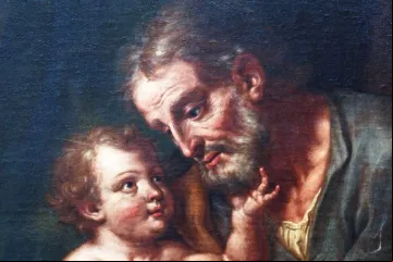 O Menino Jesus olhando com ternura para o grande são José.
