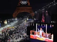 Delegações chegam ao Trocadero enquanto espectadores assistem à apresentação do cantor francês Philippe Katerine em um telão durante a cerimônia de abertura das Olimpíadas Paris 2024  em 26 de julho de 2024.