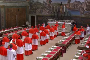 Cardeais entram em procissão na Capela Sistina enquanto começa o conclave para eleger o  267º papa