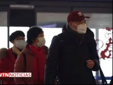 Cidadãos chineses com máscaras cirúrgicas. Crédito: EWTN Noticias