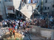 Casa destruída por bombardeio em Gaza. Seis pessoas, incluindo uma menina, morreram.