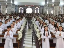 Primeira comunhão em Qaraqosh, Iraque