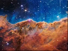 O Telescópio Webb da NASA revela Cosmic Cliffs, uma paisagem brilhante de nascimento de estrelas