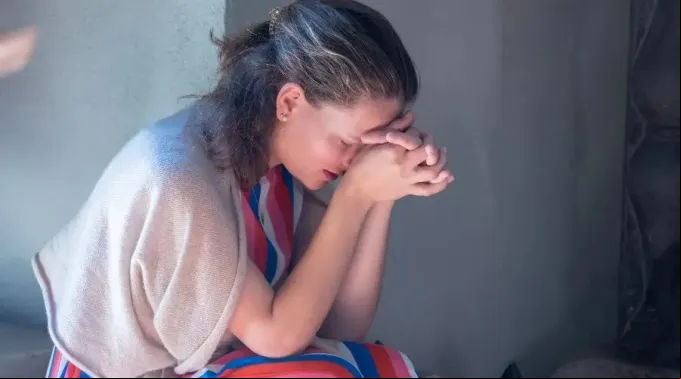 mujer_rezando_corpus_Daniel.jpg ?? 
